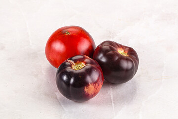Black ripe juicy organic tomato