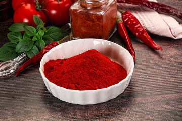 Spicy dry paprika powder in the bowl