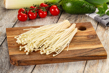 Raw enoki mushroom for cooking