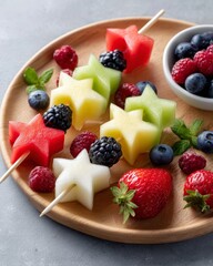 Colorful fruit arrangement with star-shaped melons and fresh berries