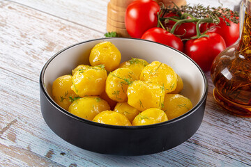 Boiled young potato with oil