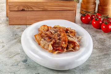 Fried crispy pork bacon snack