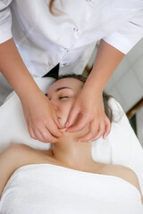 Buccal Massage Technique Performed by Professional Therapist – Natural Facial Sculpting and Anti-Aging Procedure at Spa