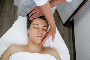 Buccal Massage Technique Performed by Professional Therapist – Natural Facial Sculpting and Anti-Aging Procedure at Spa