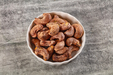 Unpeeled cashew nuts in the bowl