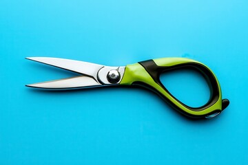 scissors on green background