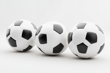 Three soccer balls on a white background