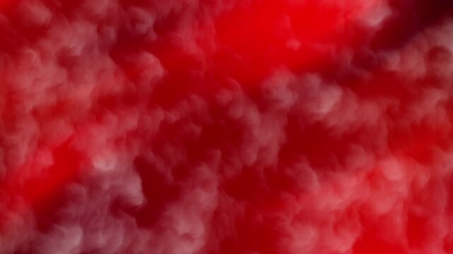 Abstract red cloud texture with soft gradients creating a vibrant background, ideal for artistic or design projects