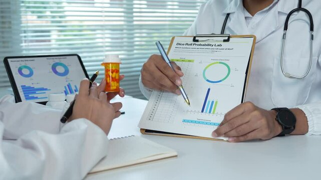 Doctors discussing probability lab results with charts and medication