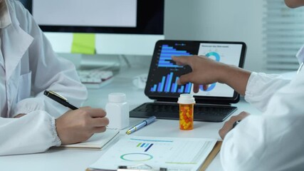 Medical professionals analyzing pharmaceutical data and medication - Powered by Adobe