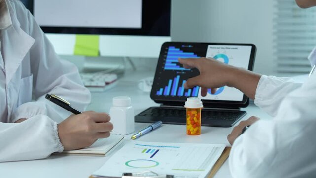 Medical professionals analyzing pharmaceutical data and medication - Powered by Adobe