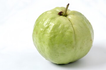 Single fresh green guava on white background
