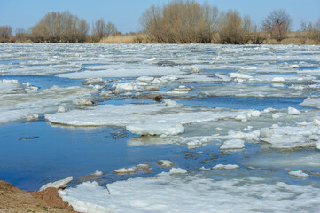 Large ice floes drifting on the Bakhthiyar River during thaw