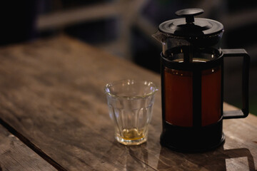 Ginger water placed in a teapot. Ready to warm your body. Pour into a glass, drink little by little.