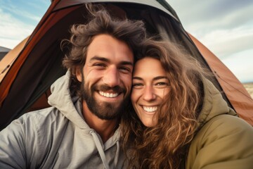 Happy young couple in camping.