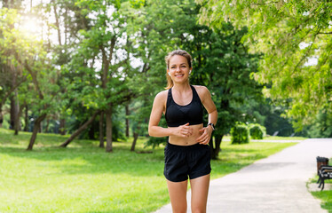 Healthy lifestyle concept young female runner in park