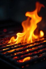 Vibrant, dancing flames lick the grill grates, creating a mesmerizing display of heat and energy, perfect for BBQ or cooking imagery Ideal for culinary, food, and summer themes , wood, charcoal