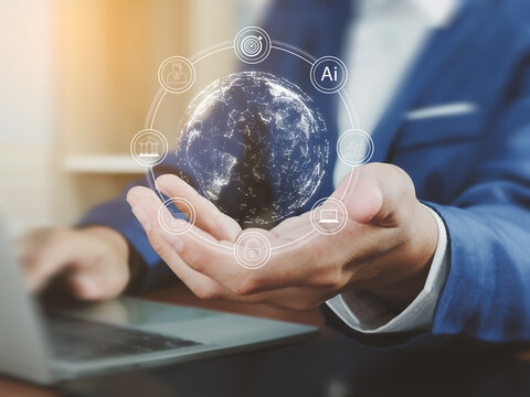 A businessman holding digital globe with ai and technology icons, futuristic concept of artificial intelligence and global network connection, innovative technology and digital transformation