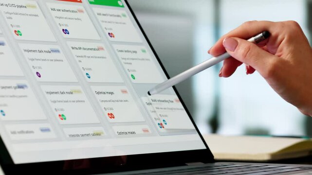 Executive Woman Using Software To Manage Project Agenda