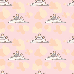 Hand-drawn lazy dinosaur on a light pink background. Seamless pattern is animal for clothing, fabric, wallpaper, backdrop, home decoration, cover book, and wall art.