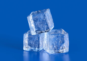 Blocks of clear ice on blue background