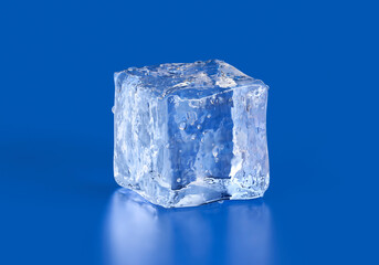 Obraz premium Blocks of clear ice on blue background