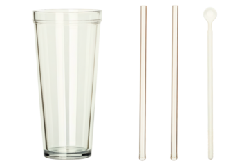 Clear drinking glass with reusable straws and a spoon isolated with transparent background