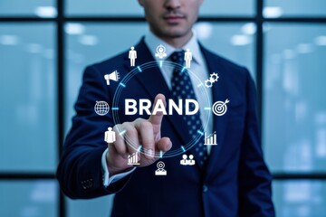 Businessman points to a holographic projection of  elements.