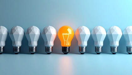 A lineup of light bulbs, with one glowing orange, symbolizing innovation and creativity among uniformity