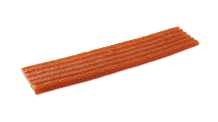 Piece of delicious fruit leather on white background