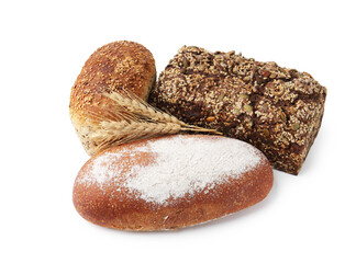 Fresh bread loaves and spikes isolated on white