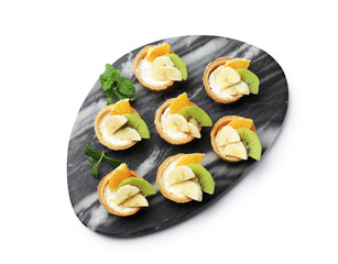 Tartlets with fruits and mint isolated on white, top view. Delicious dessert