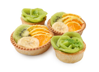 Tartlets with fruits isolated on white. Delicious dessert