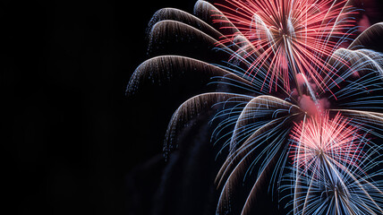 Fireworks display celebration pyrotechnics show new year's eve party colorful bright sky night event festive 100