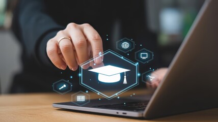 Person interacting with a virtual graduation cap overlay on a laptop.