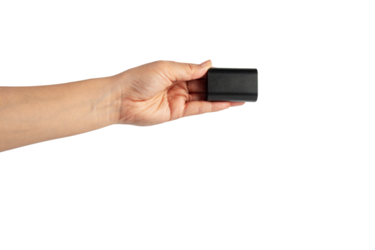 Black DSLR camera battery and hand on transparent background