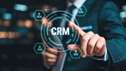 A hand pointing to a crm interface on a touch screen.