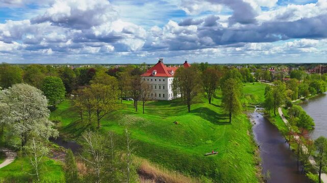 Bastion Fortress Of Birzai Castle Along Lake Sirvena In Northern Lithuania. Aerial Drone Shot
