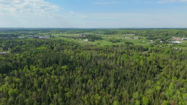 Aerial: TPC Toronto at Osprey Valley Golf Course during the day in Alton, Caledon, Ontario, Canada, establishing drone shot