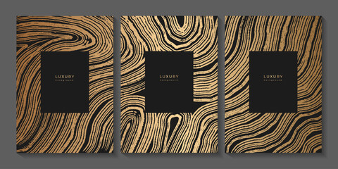 Set of gold wooden templates. Luxury gold background with wood annual rings texture. Banner with tree ring pattern. Stamp of tree trunk in section. Wooden concentric circles. Wave pattern
