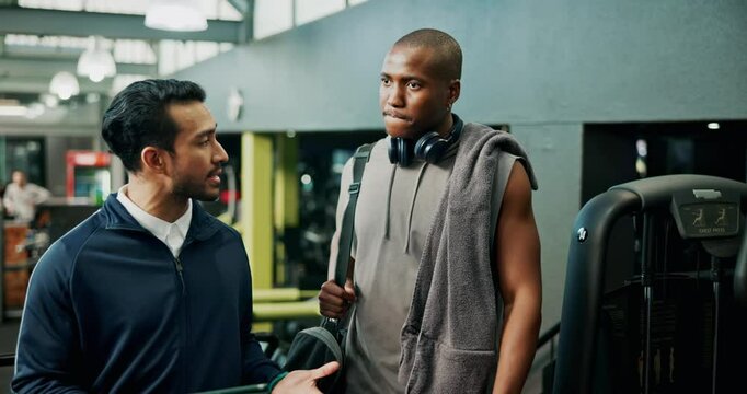 Man, personal trainer and sign up with tablet in gym for planning of training program. Advice, exercise or membership with client and fitness coach in club for development of workout schedule