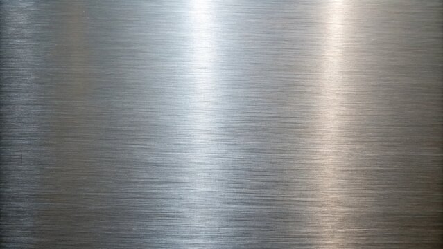 Industrial silver gradient background with brushed aluminum steel plate, grainy texture and frosted glass overlay, perfect for construction, machine engineering, manufacturing industry.
