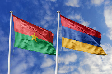 Flags of Burkina Faso and Armenia Waving Together Against a Blue Sky, Symbolizing Diplomatic Relations and Global Connections