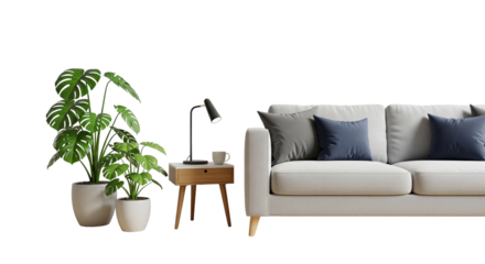 Cozy Living Room Corner with Potted Green Plants, Wooden Side Table, Lamp, Coffee Cup, and Soft Gray and Blue Cushions on Light Sofa