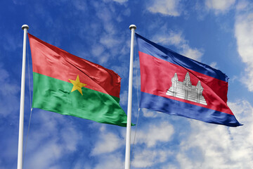 A Burkina Faso and Cambodia flag, a metaphor for Asia-African unity, wave together against a blue sky, symbolizing friendship and cultural exchange