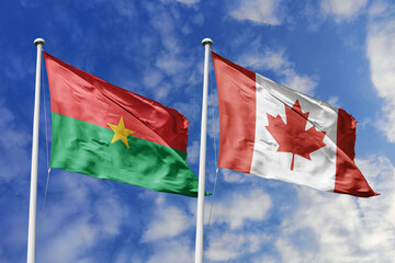 A Burkina Faso and Canada flag, a metaphor for transatlantic bonds, wave together against a blue...