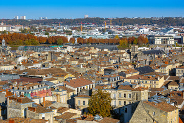 Panoramic elevated view of central and northeastern Bordeaux, showing dense old city rooftops, with...