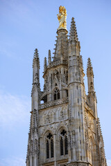 The Tour Pey Berland, featuring a golden Virgin Mary statue, stands beside the Cathédrale...