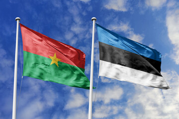 A Burkina Faso and Estonia flag, a metaphor for European-African unity, wave together against a...