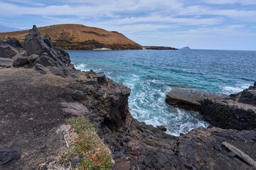 Volcanic shore at Playa Amarilla